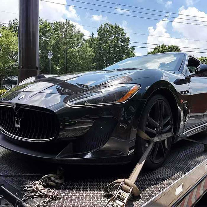 Equipment Hauling Chattanooga American Tow Company Flatbed Towing