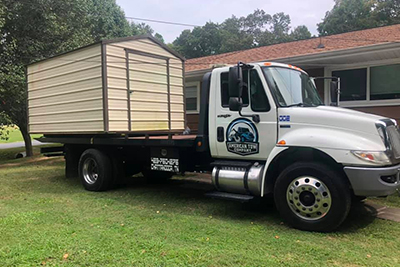 Equipment Hauling Chattanooga American Tow & Recovery Shed Hauling